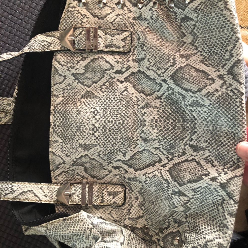 Gray snakeskin and studs attention bag. Never used. No tags